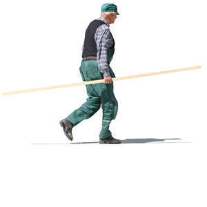 elderly man carrying a wooden board