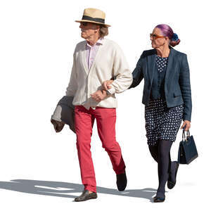 elderly couple walking arm in arm