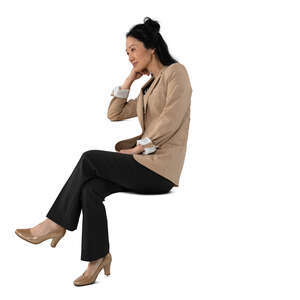cut out asian woman sitting at a table