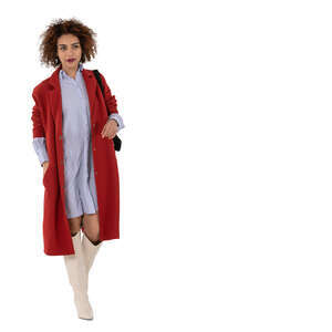 cut out woman with a light overcoat walking