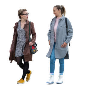 two cut out women with light autumn jackets walking