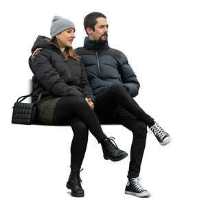 cut out couple in winter sitting together