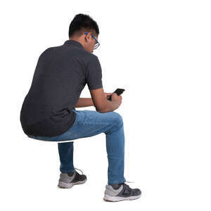cut out young man with a phone sitting 