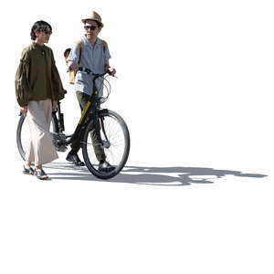 cut out backlit man and woman with a bike walking