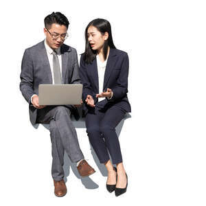 cut out asian businesswoman and businessman sitting and talking