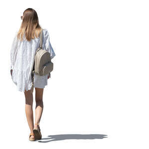 cut out woman on a white summer dress walking