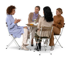 cut out women sitting in a cafe and talking