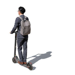 cut out young asian businessman ridin an electric scooter