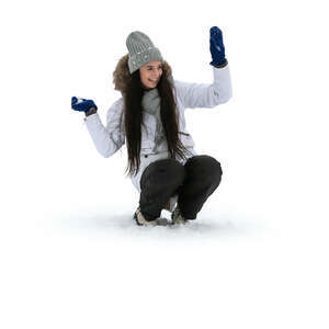 cut out woman having fun in the winter participating in a snowball fight