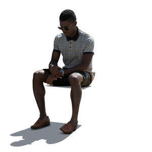 cut out backlit man sitting
