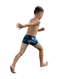 cut out little boy running at the beach