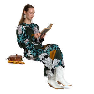 cut out woman sitting and reading a book