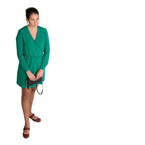 cut out woman in a green dress standing seen from above