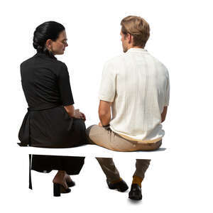 cut out man and woman sitting seen from back angle