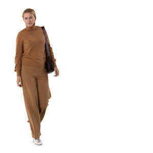 cut out woman in a brown outfit walking