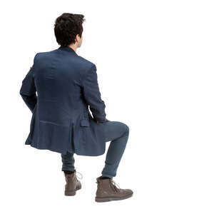 cut out man sitting seen from back angle