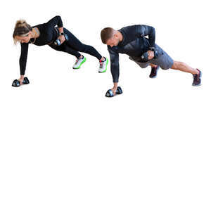 two cut out people working out