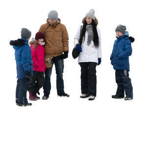 cut out family with three kids  standing together in winter