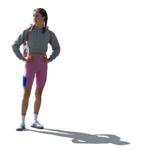 cut out backlit sporty woman standing