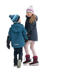 two cut out kids walking hand in hand in winter