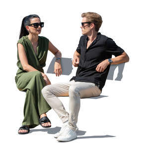 cut out man and woman sitting outside and talking