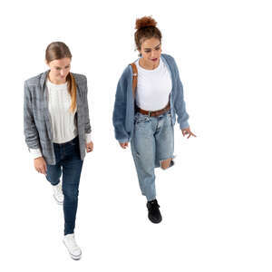 two cut out women walking seen from above