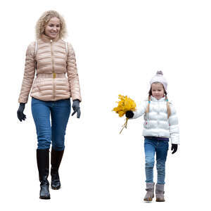 cut out woman and her daughter with a bunch of fallen leaves walking in autumn