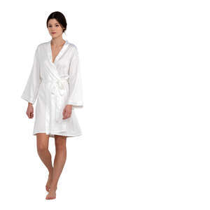 cut out woman in a white bathrobe walking barefoot