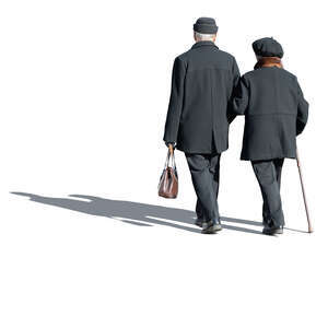 cut out elderly couple in overcoats walking arm in arm