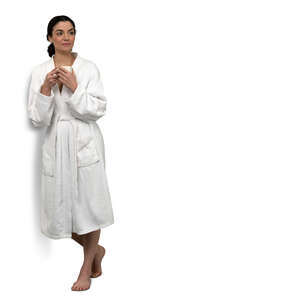 cut out woman in a bathrobe leaning against the wall and drinking coffee