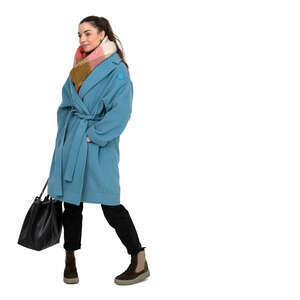 cut out woman in a blue overcoat standing