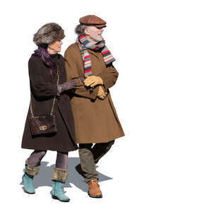 cut out elderly couple walking arm in arm in winter