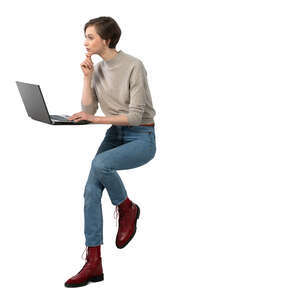 cut out woman sitting at a barstool office desk with laptop