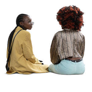 two cut out black women sitting and talking