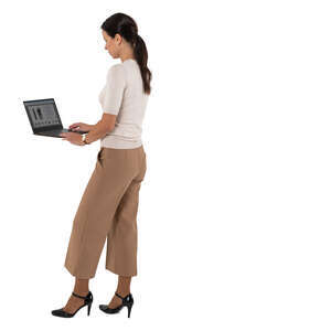 cut out woman standing and working with a laptop at a higher table