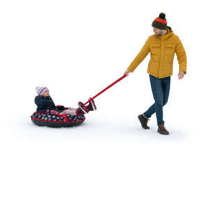 cut out father pulling a snowtube with his daughter lying on it