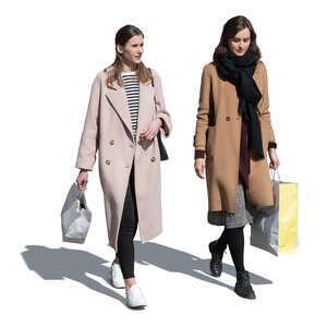 two cut out women wearing overcoats coming from shopping