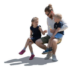 cut out backlit father with two kids sitting