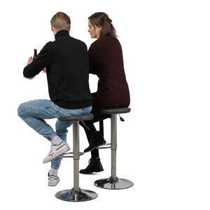 cut out man and woman sitting at a bar and talking