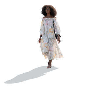 cut out backlit woman in a summer dress walking