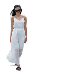 cut out woman in a long white summer dress walking