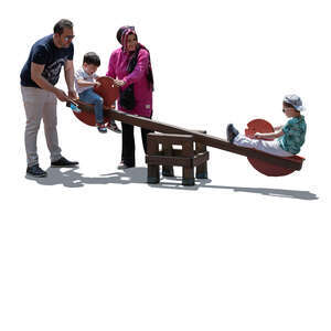 cut out backlit middle east family playing on the playground