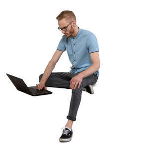 cut out man sitting and working with laptop