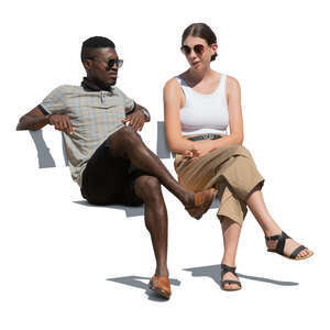 cut out man and woman sitting outside and talking