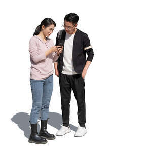 two cut out asian people standing and looking at a phone