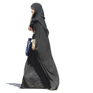 muslim woman in a black abaya walking