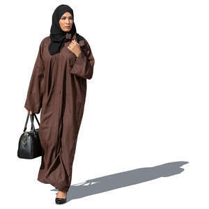 muslim woman in a brown abaya walking