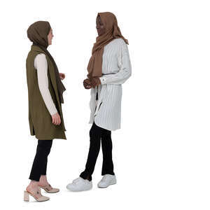 two cut out muslim women standing and talking