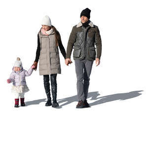 cut out family with a baby girl walking on a sunny winter day