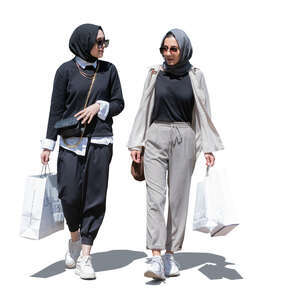 two cut out young muslim women walking